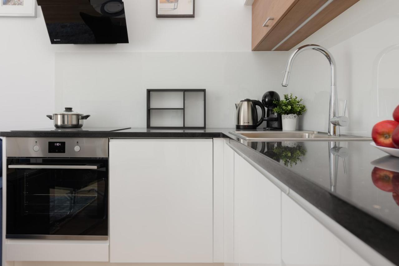 Warszawa Srodmiescie Bonifraterska Apartments By Noclegi Renters Extérieur photo